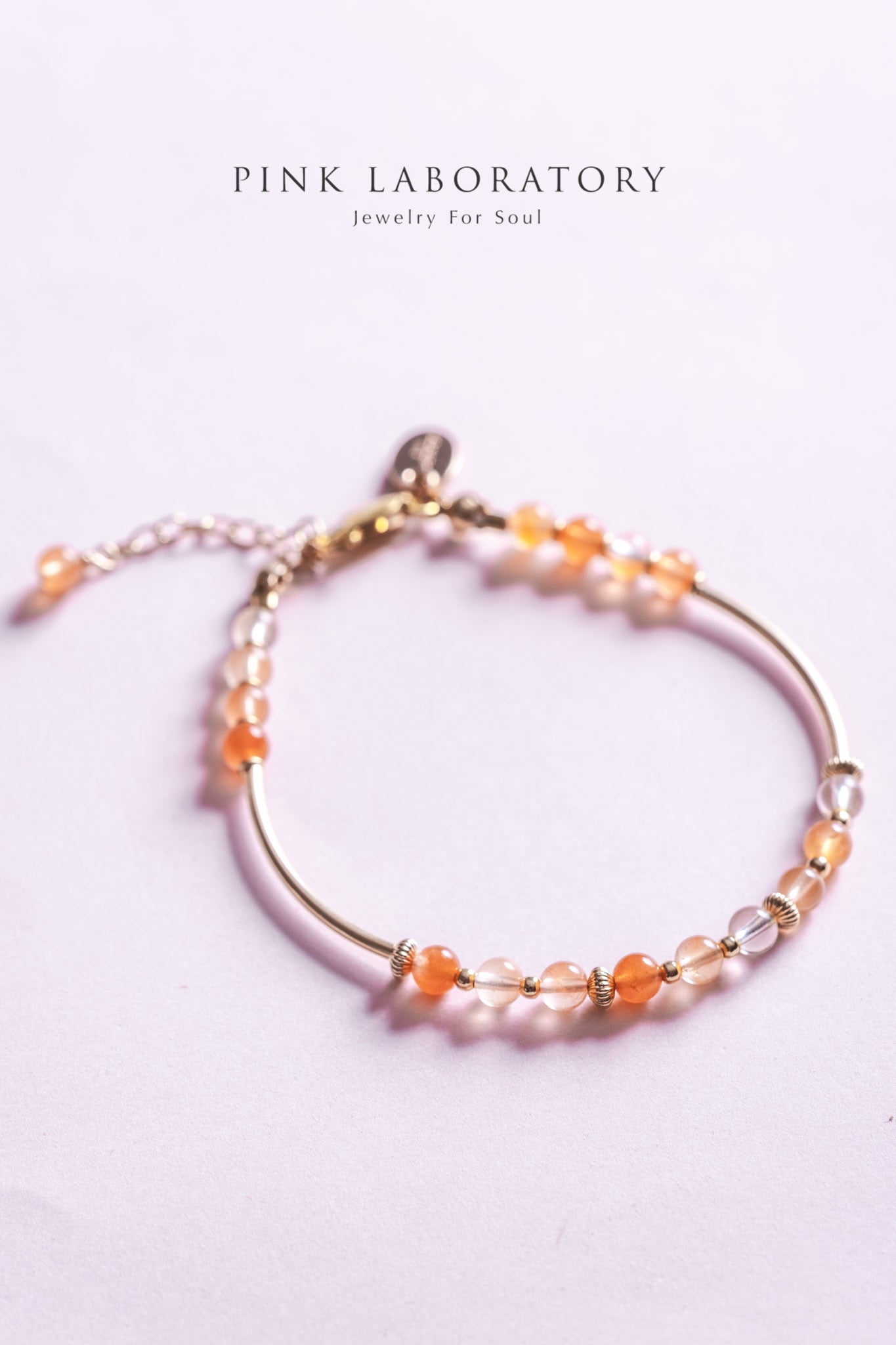 聚寶盆紅兔毛紅髮晶14KGF手鍊