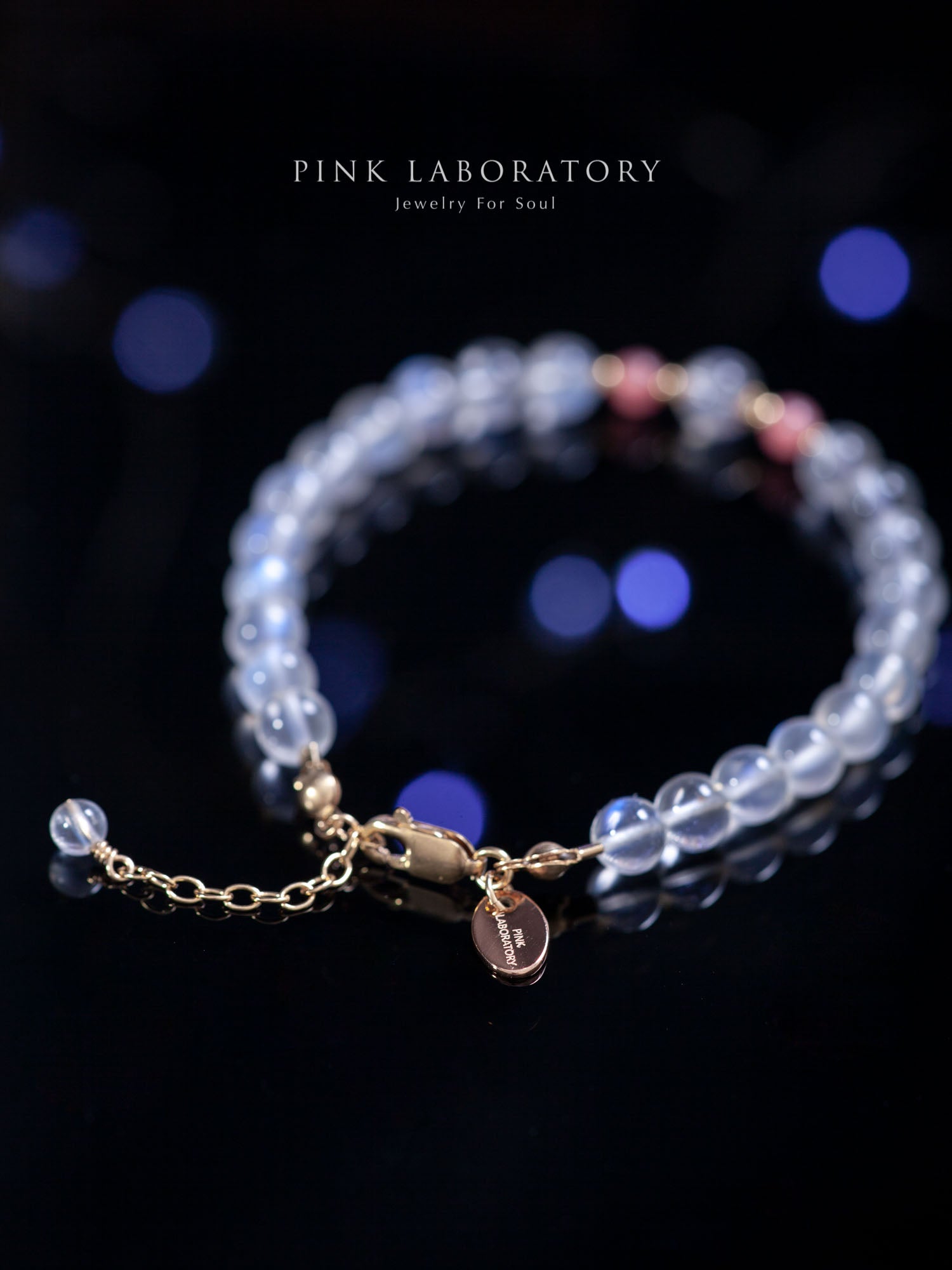 奶油月光石紅紋石手鍊